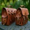 Pair of brown leather saddlebags style S1004 with side pockets and rear straps