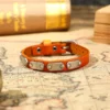 Brown T8092 leather bracelet with rectangular metal plates