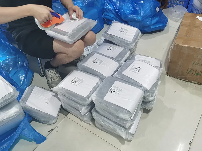 Bulk wholesale leather handbags properly arranged inside export shipping carton